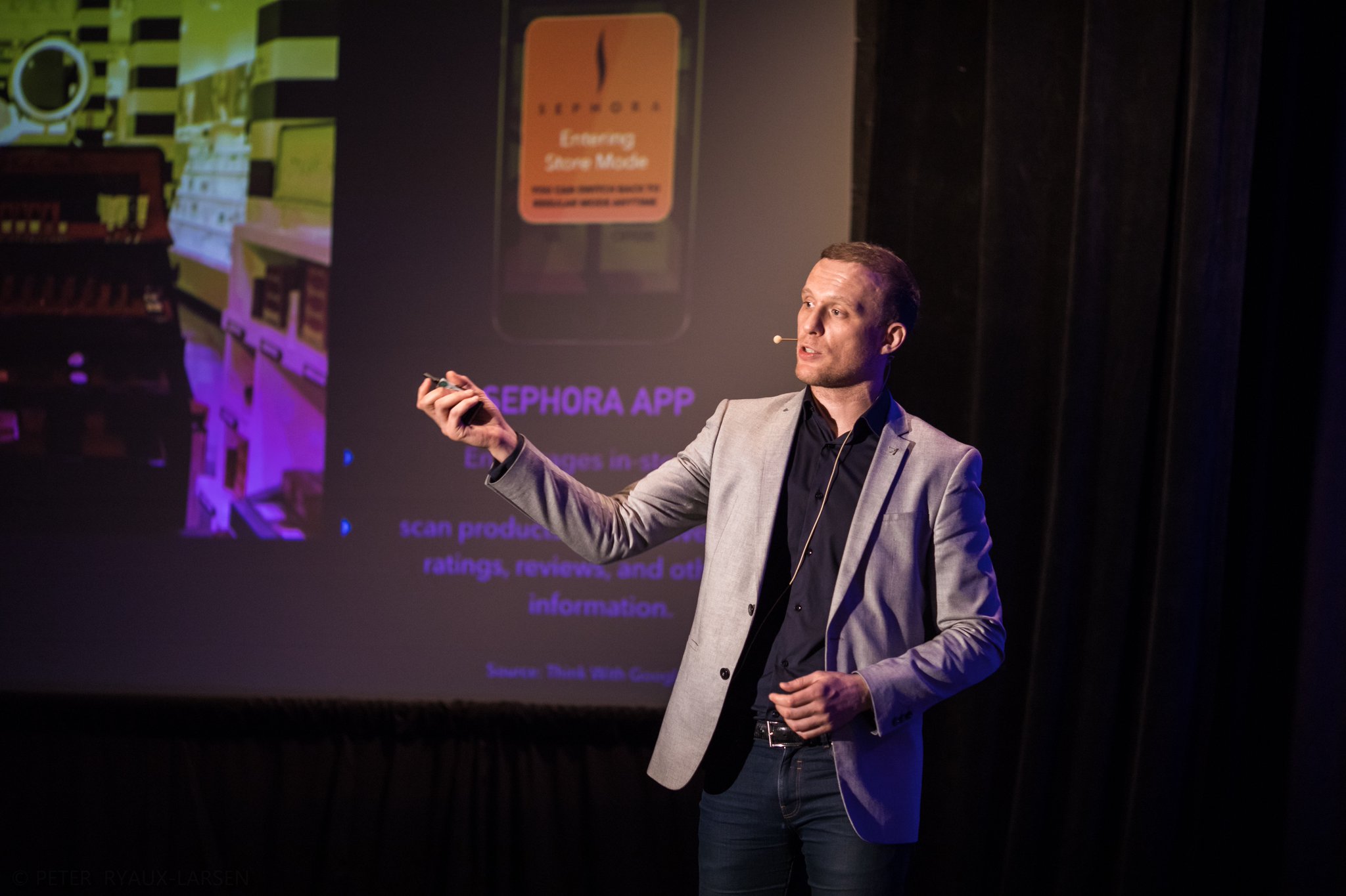 Awane Jones presenting on stage